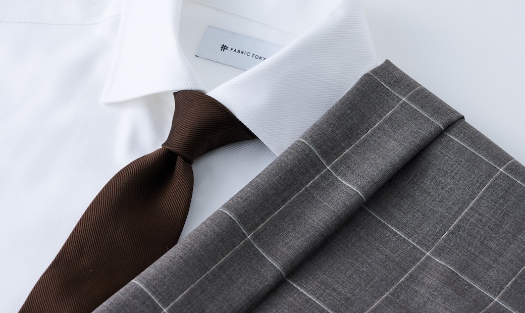 FLX WOOL WASHABLE ブラック平織り無地ツーピーススーツ